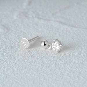 Detailed view of S925 sterling silver star stud with 925 certification stamp and zircon