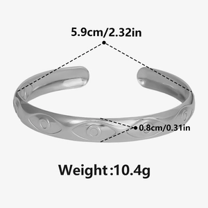 Detail view of evil eye cuff bracelet with measurements: 5.9cm diameter and 0.8cm width