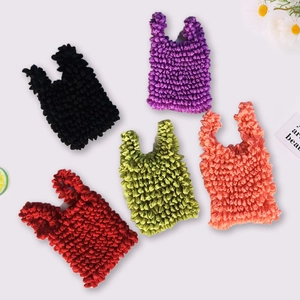 Colorful pleated magic bubble handbags in five vibrant knitted textures and tones