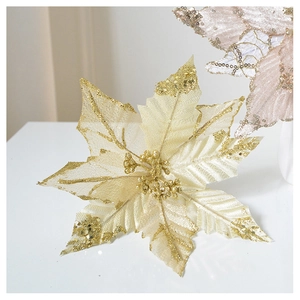 Macro detail of champagne gold glitter poinsettia flower for Christmas tree decoration