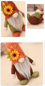 Detailed views of sunflower gnome plush with knitted orange hat for autumn decoration