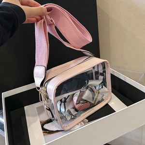Pink transparent PVC crossbody bag with wide strap and decorative silk scarf detail