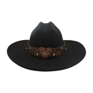 Detail of western wool fedora featuring a leather band and rhinestone heart buckle