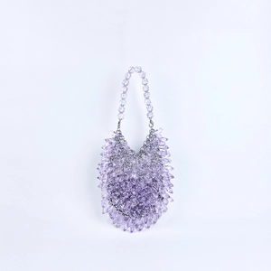 Detail of light purple handmade acrylic beaded handbag with reflective droplet texture
