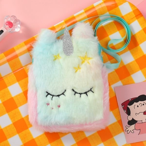 Detail of plush unicorn bag showing rainbow fur, silver horn, and embroidered star details