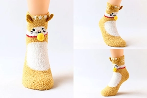 Three-way view of coral fleece cat socks with 3D ears and yellow pompom details