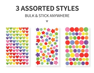 Close-up of colorful heart, star, and circle stickers for DIY scrapbooking decoration