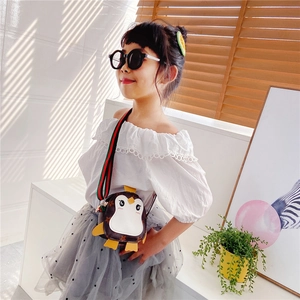 Cute penguin-shaped kids crossbody bag with monogram pattern and striped strap