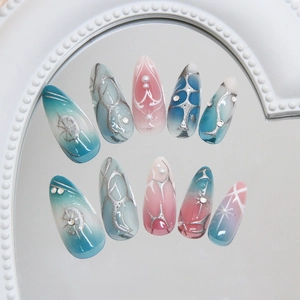 Chic gradient pearl press-on nails with 3D silver lines and metallic star accents