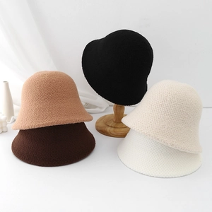 Minimalist wool cloche bucket hat for women in multiple colors with textured fabric