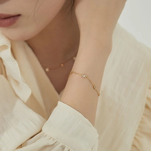 Elegant gold titanium bracelet with rectangular zircon stones for women's jewelry collection
