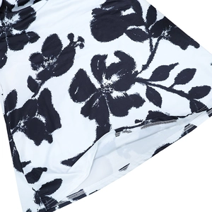 Detailed macro view showing the floral ink print and high-quality hem stitching