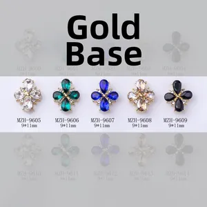 Macro shot of 9x11mm 3D flower cross nail art charms with colorful rhinestones