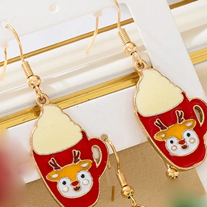 Close-up of red Christmas mug earrings with cute elk pattern and white foam detail