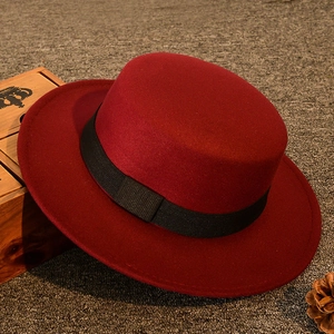 Deep red flat top wool felt fedora hat with black ribbon, classic vintage style