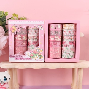 Pink washi tape set with cute small floral bronzing designs, perfect for DIY journaling and crafts.