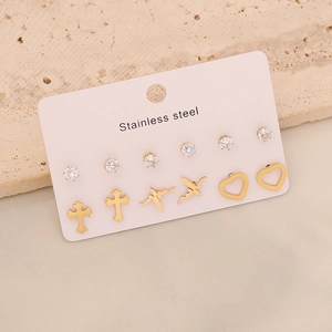 Detailed set of six pairs of gold plated stainless steel stud earrings on card