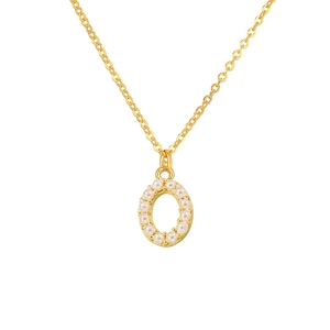Macro detail of gold plated necklace featuring pearl-inlaid letter O pendant