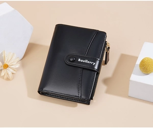 Detail view of black bifold wallet with secure metal zipper and embossed branding logo