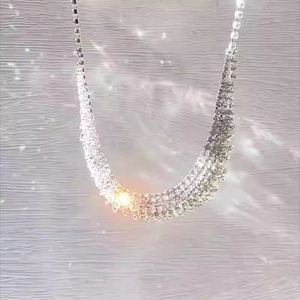Exquisite multi-row rhinestone tassel necklace in silver finish with sparkly fringe design