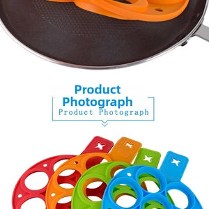 Detail of multi-colored silicone pancake molds with heat-resistant handles for kitchen DIY