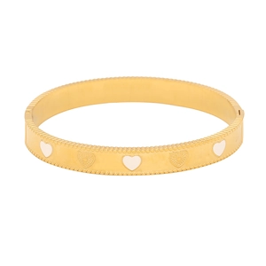 Detailed view of vintage gold heart bracelet with white inlay and beaded edge accents