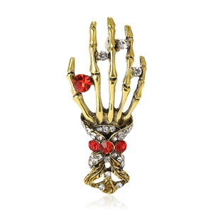 Vintage punk skeleton hand brooch with gold plating, rhinestones and red crystal accents