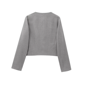 Back view of a cropped grey suit jacket showing clean lines and premium fabric texture