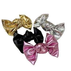 Metallic faux leather bow hair clips set in gold silver black and pink colors