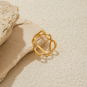 Elegant gold and silver two-tone stainless steel ring with minimalist hollow overlapping design