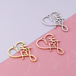 Three heart-shaped Faith pendants in gold, silver, and rose gold finishes