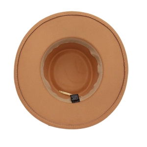 Close-up of camel wide brim felt hat interior showing 65% cotton blend label and sweatband