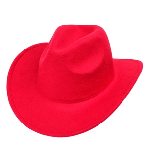 Detailed close-up of a bright red wool felt western cowboy hat with a wide curved brim