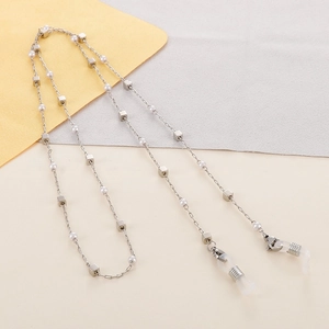 Detail of silver alloy eyeglass chain with faux pearls and silicone anti-slip loops
