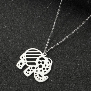 Close-up of geometric hollow elephant pendant necklace with textured metallic finish