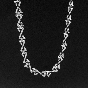 Silver hip hop necklace with geometric triangle links in a minimalist fashion style
