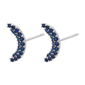 Detailed view of crescent moon stud earrings with blue pave zircon in silver setting