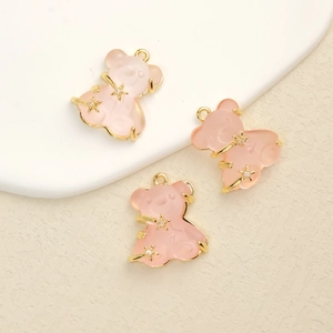 Three cute pink resin teddy bear charms with gold-plated metal frames and tiny star zircons