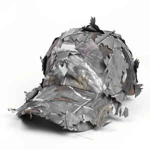 Detailed view of 3D leaf camo baseball cap with realistic forest camouflage texture