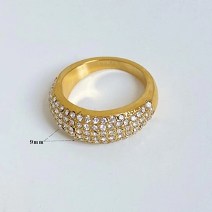 Detail view of a 9mm gold plated stainless steel ring with white zircon rows