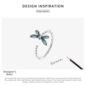 Artistic detail of s925 silver dragonfly ring with blue enamel wings and zircon accents