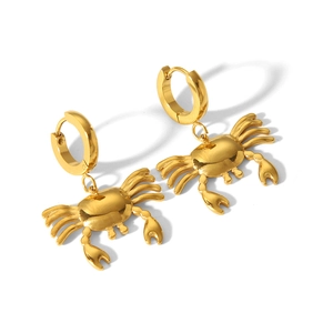 Golden crab drop earrings made of 18k gold plated stainless steel on white background