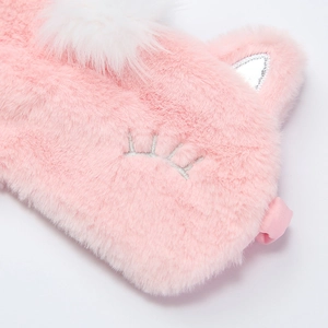 Cute pink plush unicorn sleeping mask with soft faux fur and embroidered closed eyes detail