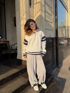 Women's college style grey half-zip sweatshirt and wide-leg sports pants set