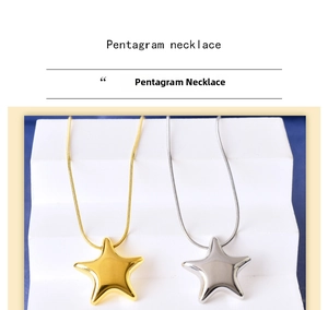 Detailed close-up of polished star pendant necklaces in gold and silver finish