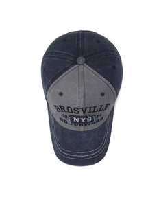 Close-up of vintage washed cotton baseball cap with NYS embroidery and BROSVILLE patch