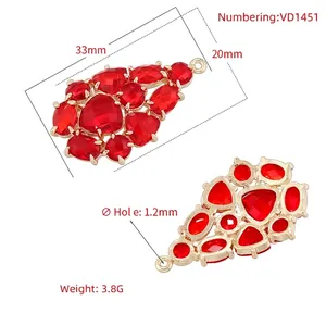 Elegant gold drop pendant with red multifaceted glass crystals and sizing details