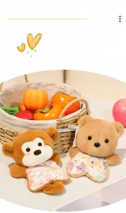 Close-up of plush monkey and bear dolls featuring floral fabric details and soft brown fur