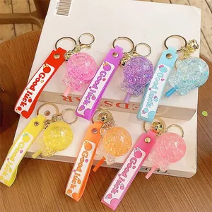 Luminous glitter lollipop keychain set with colorful PVC hand straps and metal hooks