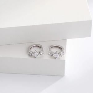 Detail view of S925 sterling silver hoop earrings with princess cut square zircon stones